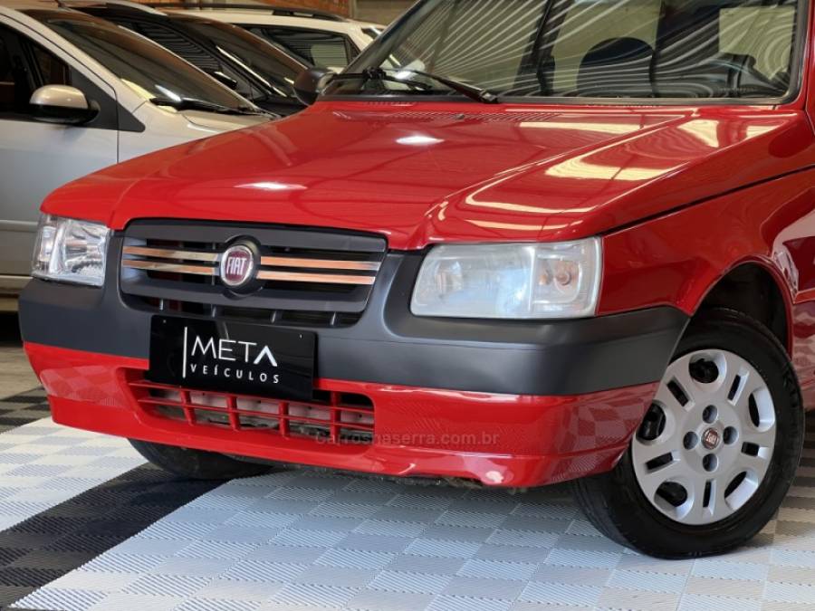 FIAT - UNO - 2010/2011 - Vermelha - R$ 21.990,00