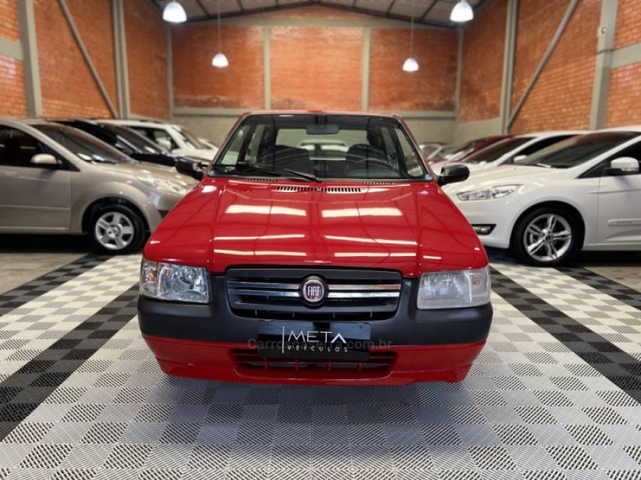 FIAT - UNO - 2010/2011 - Vermelha - R$ 21.990,00